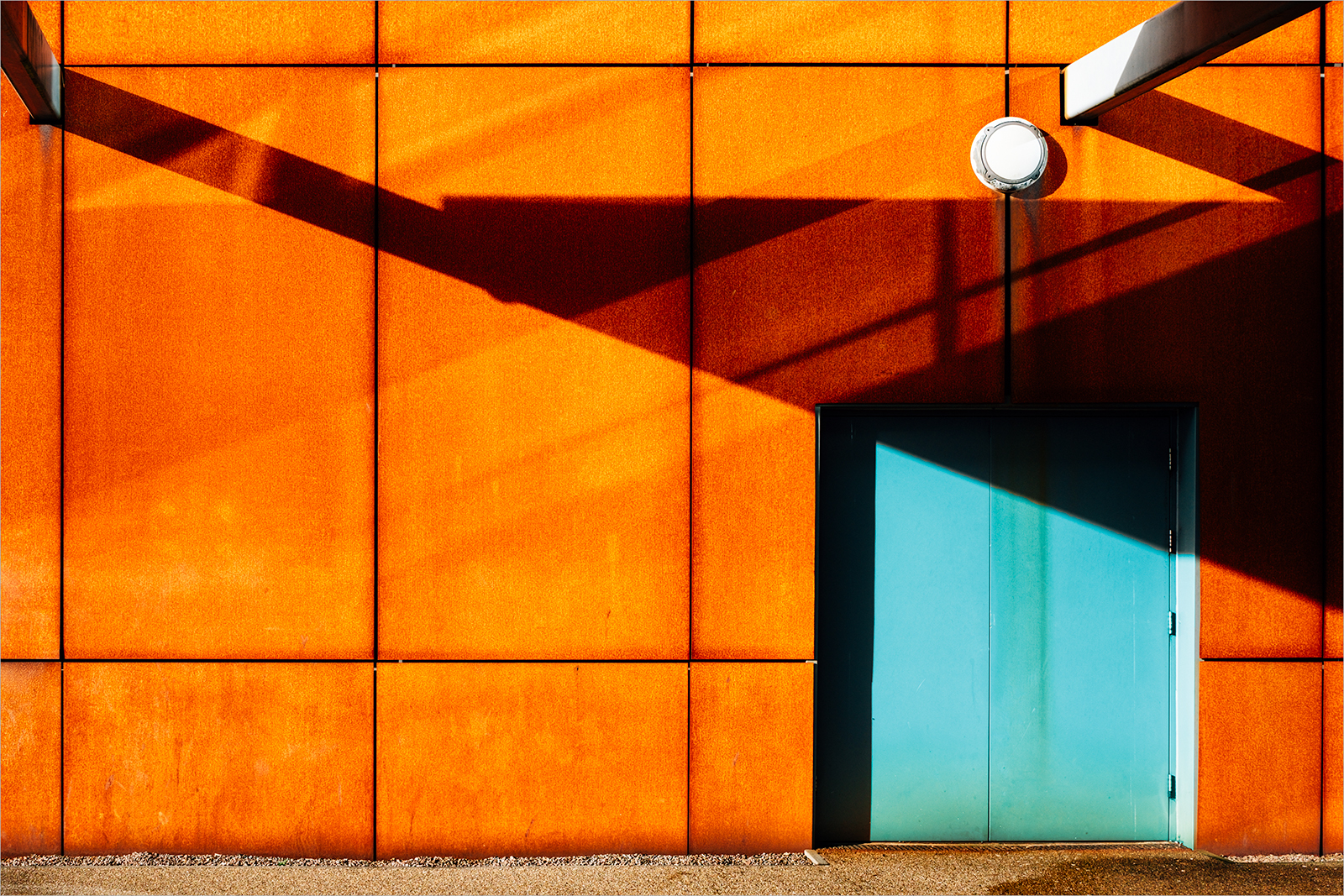 Rusty metal wall on a sunny afternoon.jpg