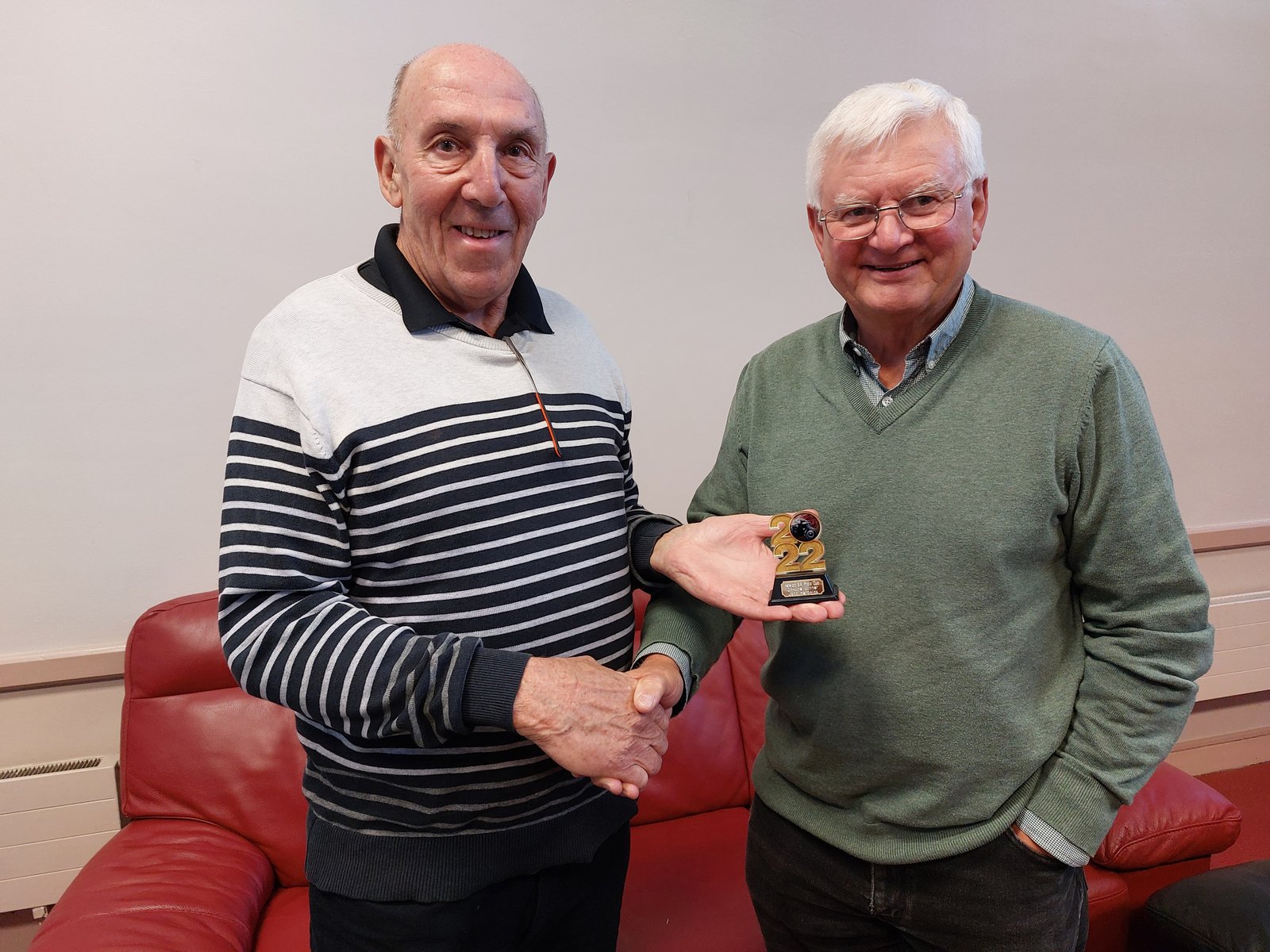 John Harwich receiving his trophy